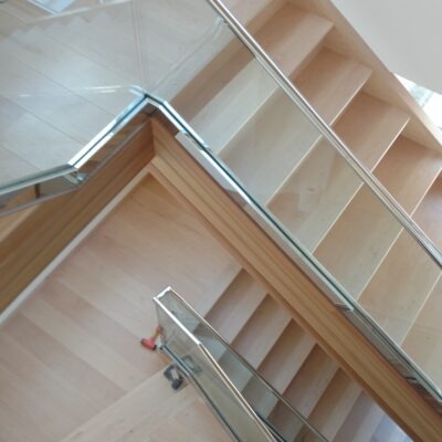 Glass Unlimited polished stainless grab rails hand rails or banister with star fire glass balusters.