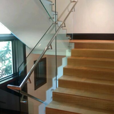 Glass Unlimited polished stainless grab rails with Glass Unlimited Glass inserts.